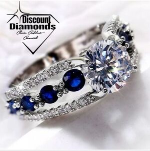 Blue Sapphire & Clear White Diamond Center Stone & Baguette Diamonds